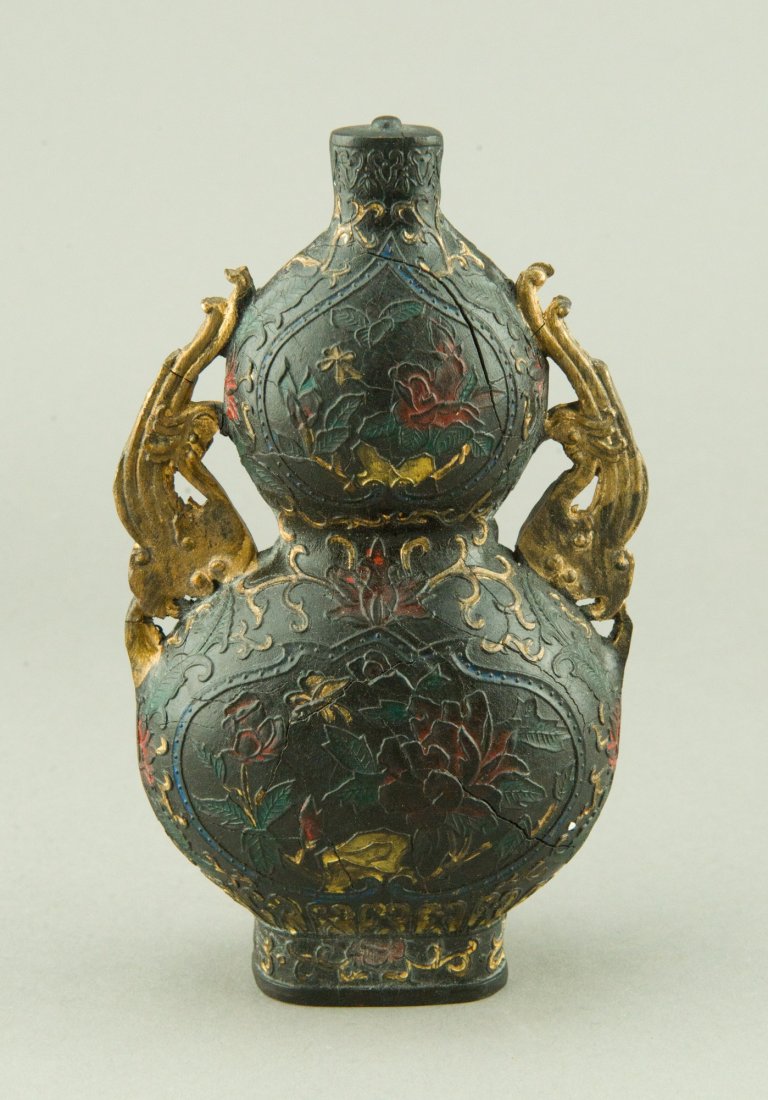 Chinese Gilt Calabash Shaped Ink Stick Qianlong MK: Chinese ink stick the body of calabash shape carved flowers in low relief and flanked by a pair of gold painted winged dragons, the body presented with cracks, with five-character Qianlong mark on bas
