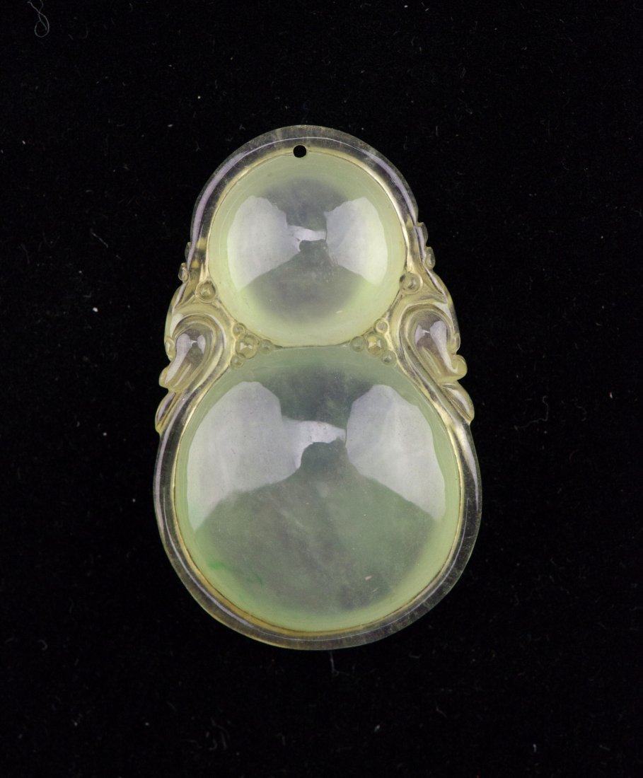Chinese Icy Jadeite Double Dragon Pendant: Chinese icy jadeite pendant, of translucent yellow and green tone, featuring double dragons with sea pearls. L: 4.5 cm W: 2.5 cm 20 grams.