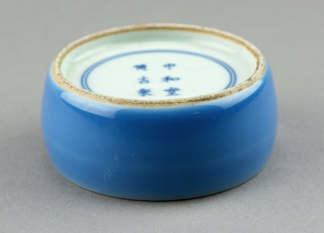 Kangxi Period Chinese Sky Blue Porcelain Ink Well: Kangxi period, Chinese porcelain ink well, of drum form with concave top with ink hole, body glaze in sky blue, base marked Zhong He Tang Bo Gu. H: 3.5 cm, D: 7 cm, 195 grams. Liu Collection Toronto