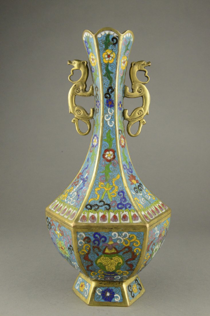 Chinese Cloisonne Vase Chilong Handles Qianlong Mk: Chinese bronze cloisonne vase, of hexagonal sectioned pear shaped vase, flanked with pair of gilt Chilong as handles on neck. Body enamel painted with floral sprays on blue ground. Bottom with four ch