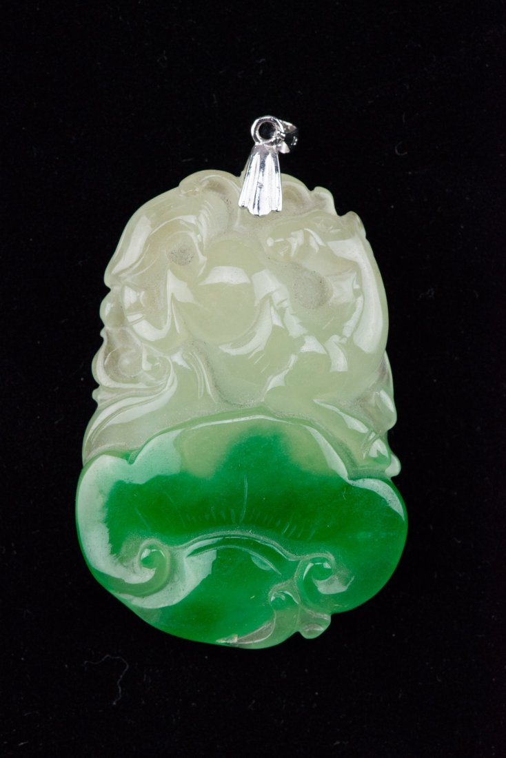 Chinese Jadeite Carved Monkey & Ruyi Pendant: Chinese jadeite carved pendent, featuring monkey, horse and ruyi. The stone of white and emerald green tone. H: 5.5 cm, W: 3.6 cm, 41 grams.