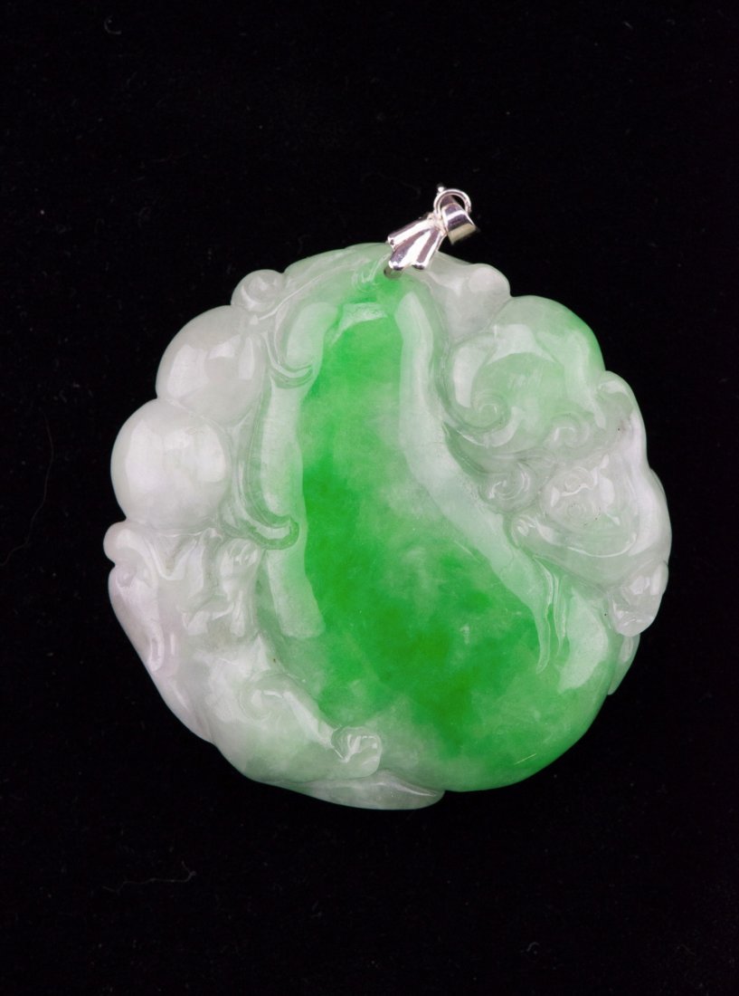 Chinese Jadeite Carved Monkey & Fruit Pendant: Chinese jadeite carved pendant, featuring Qilin, gourd, fruit, ruyi and monkey. The stone of white and emerald green tone. D: 5 cm, 50 grams.