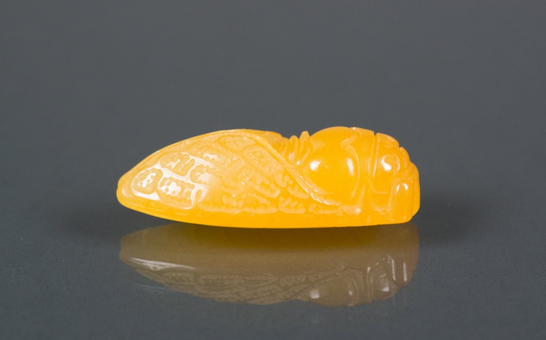 Indonesian Jin Tianhuang Carved Cicada Toggle: 中南半岛田黄石雕蝉吊饰 Indonesian Tianhuang stone carved toggle; featuring cicada in relief; of light honey tone; pierced for suspensi