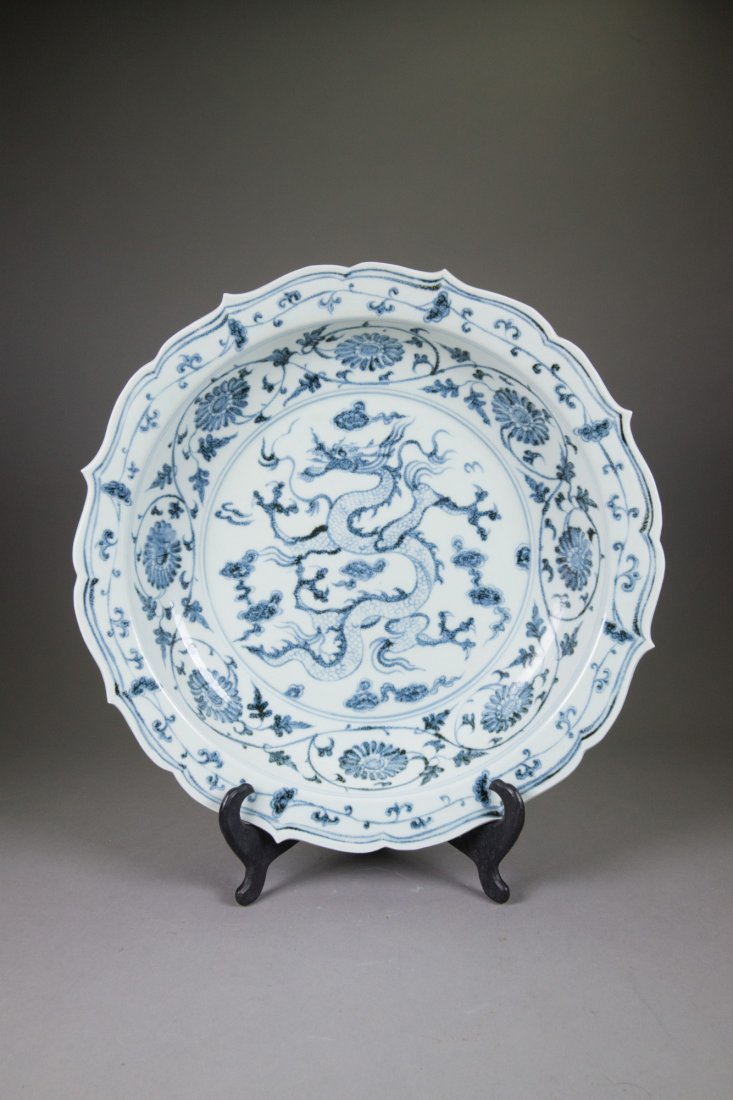 Chinese Blue & White Dragon Charger Ming Mark: 青花龙云菊花纹菱花大盘 Chinese blue and white porcelain charger; featuring dragon amid stylized ruyi head cloud scrolls and flaming pe