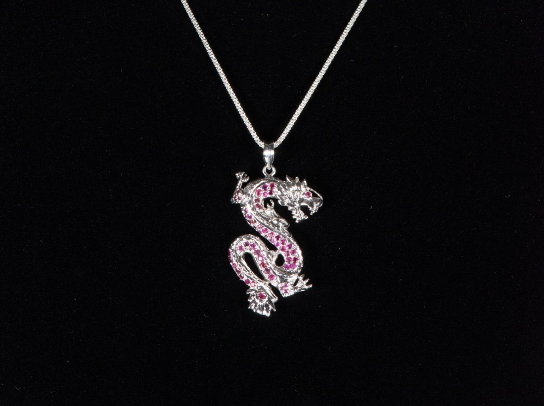 Sterling Silver 1.30 ct. 53 Round Ruby Pendant: 镶红宝石银挂件项链 附证书 One large dragon style ruby pendant; matching open link chain, both of which are sterling silver; pend