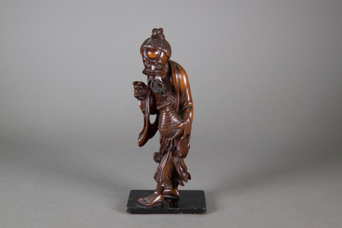 19th C. Chinese Wood Carved Old Man: 十九世纪木雕老人像 19th C. Chinese wood carved figure; depicting an old man with a straw jar; H: 24 cm, W: 10 cm