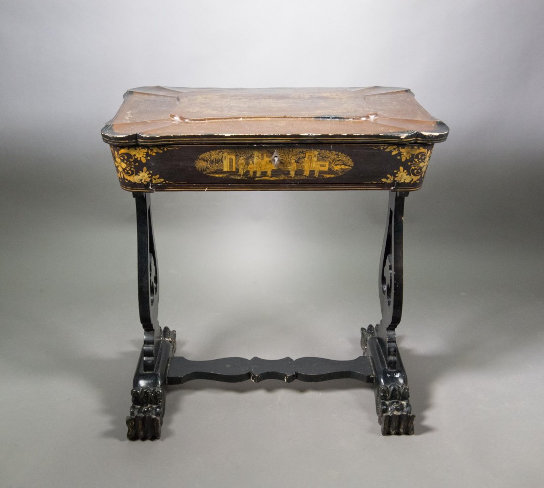 Chinoiserie Lacquer Sewing Table Ivory Pieces: Fine antique English Chinoiserie sewing table; black lacquer with gilt; all interior compartments and ivory-lidded tops complete; within the compartmentalized box featuring ivory sewing pieces; the pa