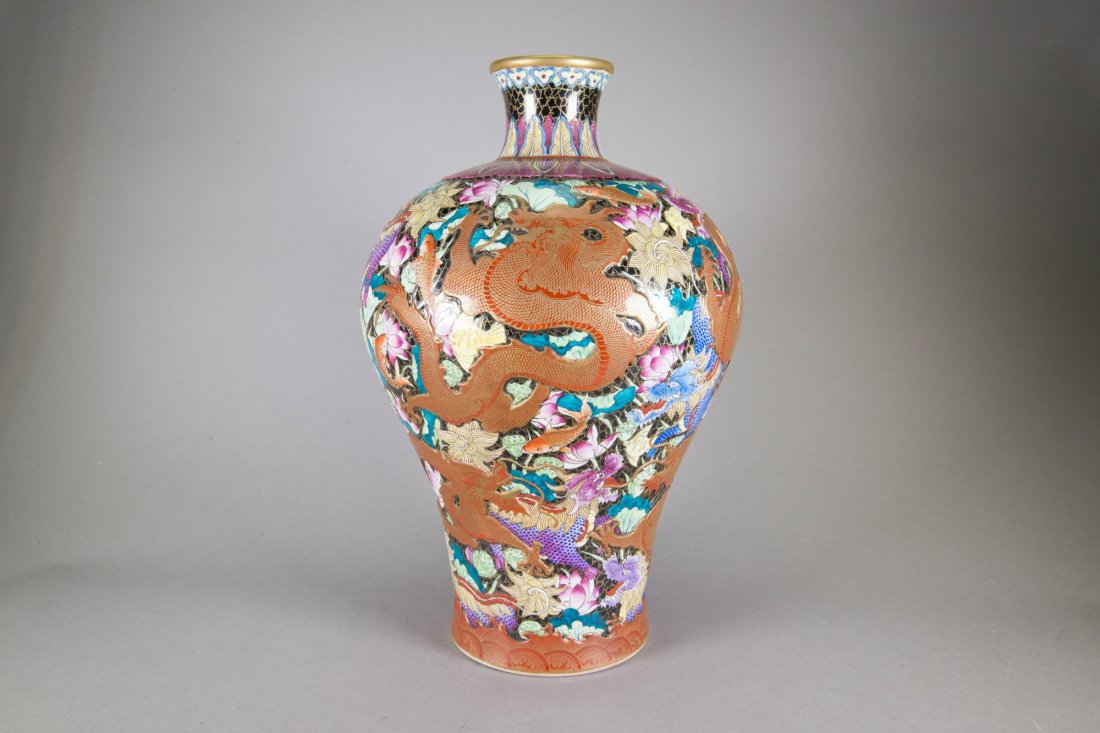 Chinese Famille Rose Dragon Carved Large Vase: Chinese Famille Rose dragon carved porcelain vase; featuring low-relief gilt dragon and lotus on body; six-character Qianlong mark on base; H: 43 cm, W: 25 cm, 5.2 kg