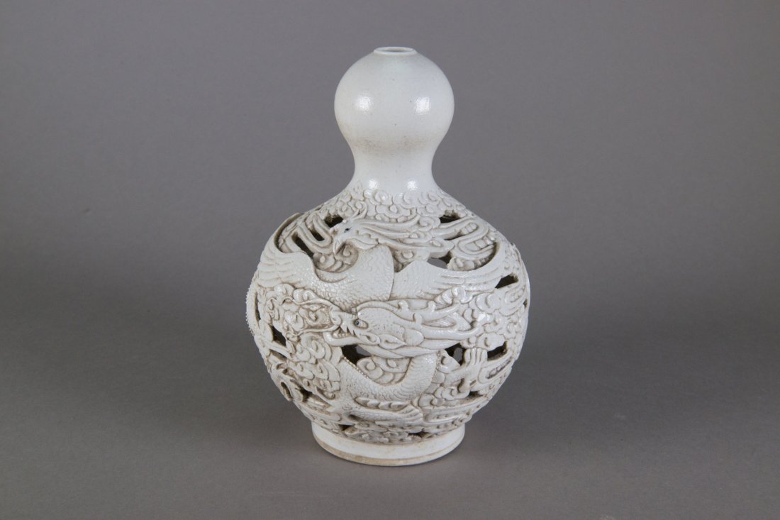 Chinese Porcelain Round Vase Wang Bingrong: Chinese porcelain round vase; of globular body with a rounded opening; featuring openwork carvings of dragon and phoenix; four-character Wang Bingrong mark on base; 636 grams