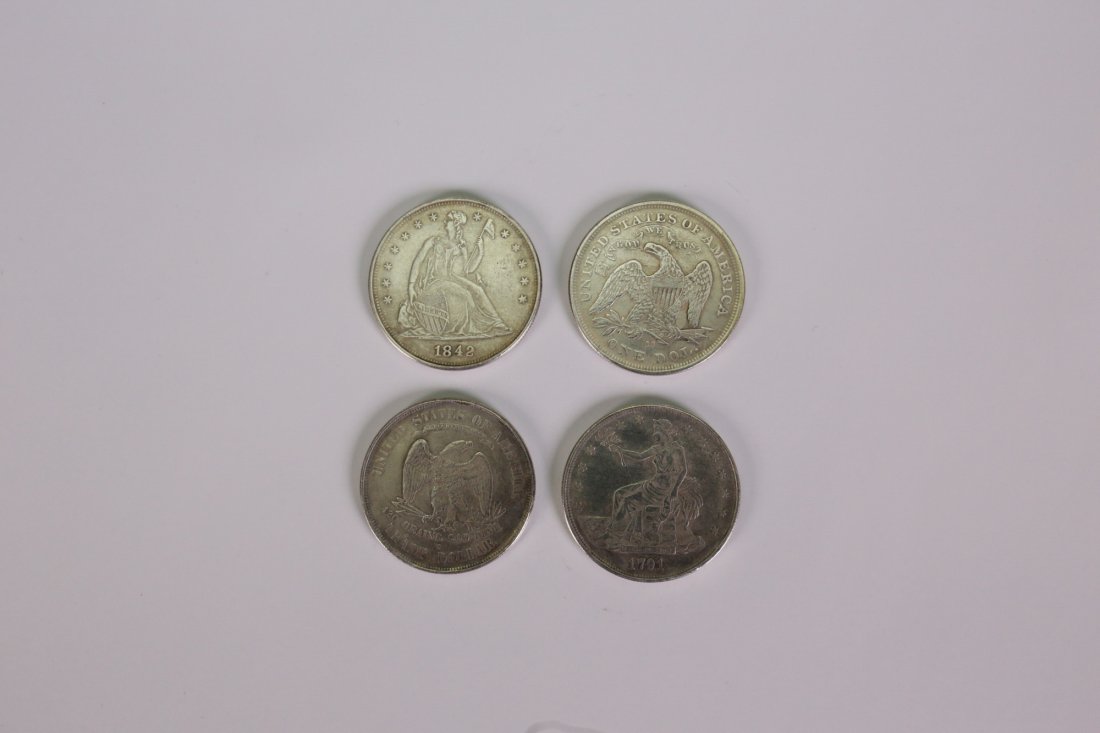 4 Pieces of American Silver Coins: Four pieces of American silver coins; with "United States of America Trade Dollar" mark; dated 1842 and 1791; D: 4 cm, 90 grams total