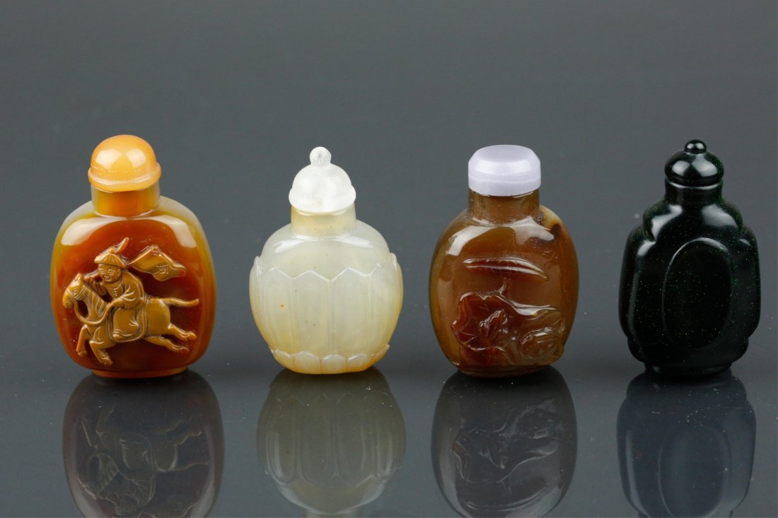 4 Pieces Chinese Agate Snuff Bottle: Four pieces of Chinese agate snuff bottles; featuring figures and lotus on body; of various brown and black tone; H: 6.5 cm, W: 4 cm, 164 grams total