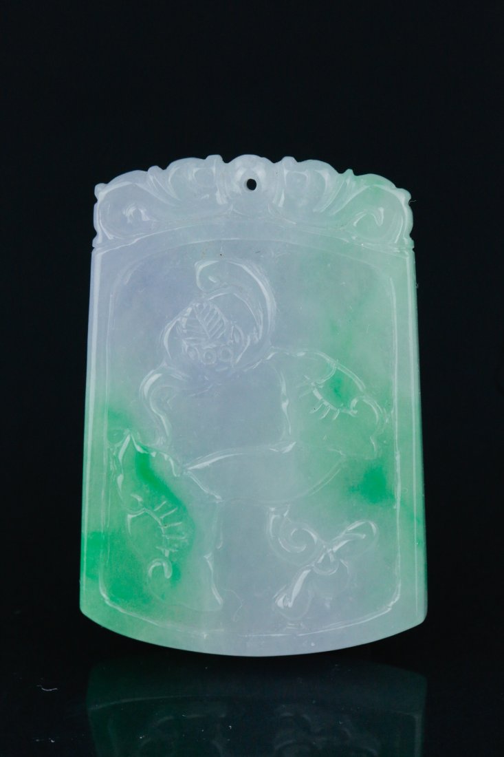 Chinese Green Jadeite Square Pendant: Chinese jadeite pendant; of rectangular form; featuring lingzhi mushroom and bat in low relief on both sides; of green and lavender tone; pierced for suspension; H: 5 cm, W: 3.5 cm, 25 grams; Density: