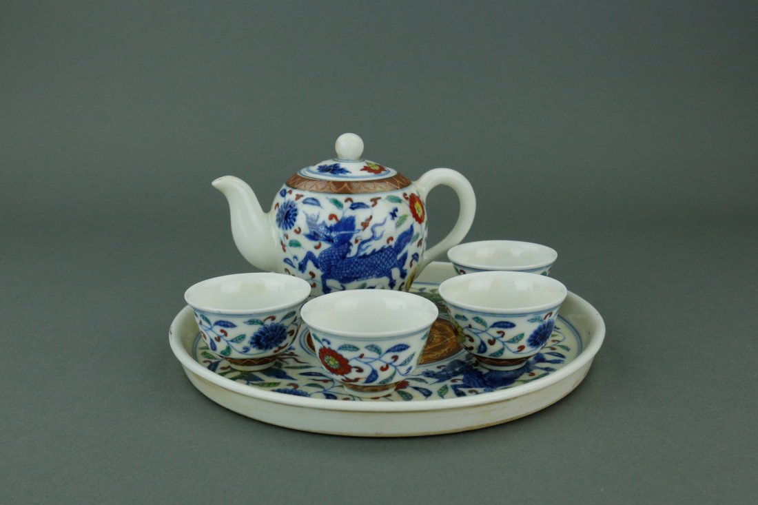 6Pc of Famille Rose Porcelain Tea Set Ming Mark: Six pieces of Chinese Famille Rose porcelain tea set; comprised of a globular teapot, four tea cups and one tea tray; featuring Qilin and scrolling flower on body; six-character Ming Chenghua mark on 