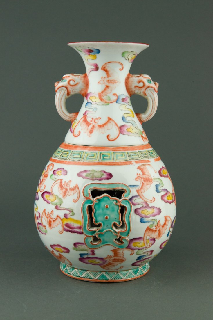 Famille Rose Two Part Reticulated Vase Qianlong MK: Chinese Famille Rose two part porcelain vase, of bulbous form body with detachable neck and vessel. Body with open works carvings painted auspicious bats and clouds, open work window revealing inner b