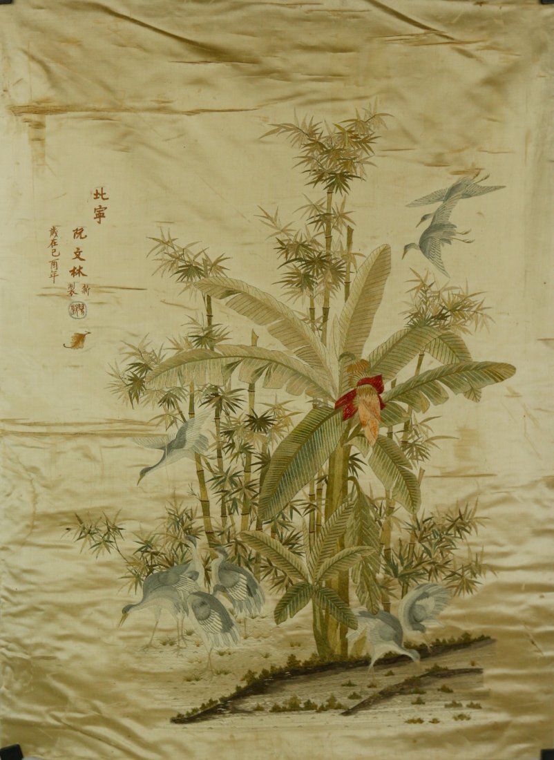 Vietnamese/French Embroidery of Birds and Trees 1909: Vietnamese or French style embroidery; featuring cranes under banana tree and bamboo; embroidered artist signature Ruan Wenling; French Custom stamp on reverse; 1909; 94 cm x 68 cm