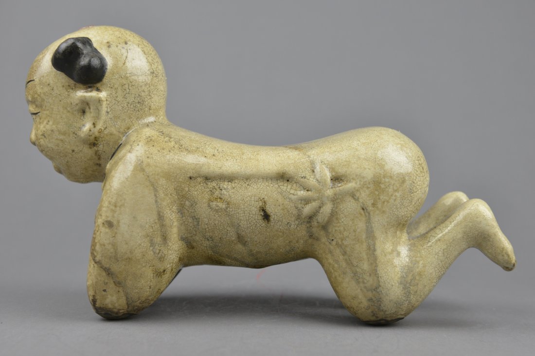 Chinese Porcelain Pillow in Form of Boy (1 of 5)