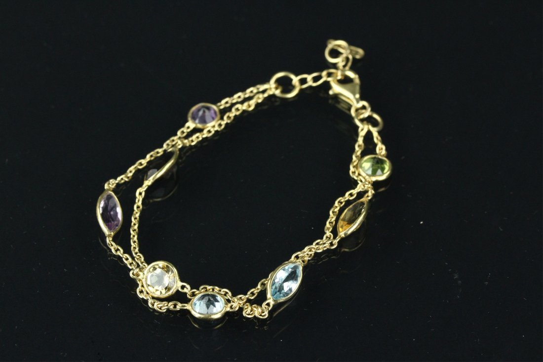 Sterling Silver Gold Gemstone Bracelet CRV $650: 镀银宝石手链带$650估价证书 One ladies link necklace; stamped 925 sterling silver with gold plating; with eight natural coloured amethy