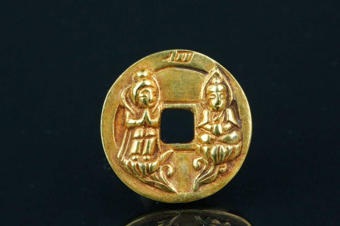 Chinese Gold Coin Carved Double Guanyin: 淳化元宝礼佛钱一枚 Chinese gold coin; of circular form with square hole at centre; featuring two Guanyin in high relief on one side and four-chara