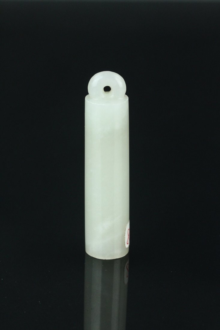 Chinese Old White Hardstone Carved Finial: 老白硬岩翎管 Chinese old white hardstone carved hat ornament lingguan; of cylindrical form with pierced top; L: 6.5 cm, W: 1.5 cm, 24 grams