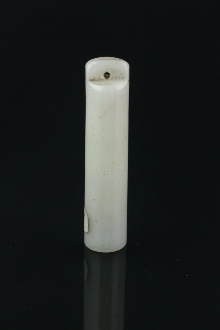 Chinese Old White Hardstone Carved Hair Finial: 老白硬岩翎管 Chinese old white hardstone carved hat ornament lingguan; of cylindrical form with pierced top; L: 7 cm, W: 1.5 cm, 19 grams