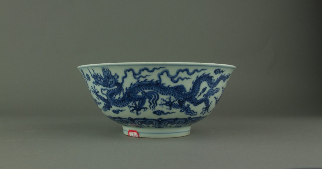 Blue & White Dragon Porcelain Bowl Xuande Mark: 宣德款 青花龙纹碗 Chinese blue and white porcelain bowl; of deep rounded sides with a circular foot rim; the exterior painted with five-clawed striding 