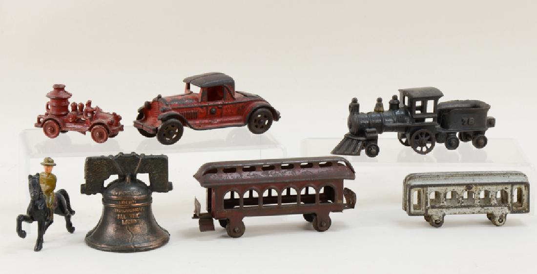 7 cast iron & steel toys (1 of 1)