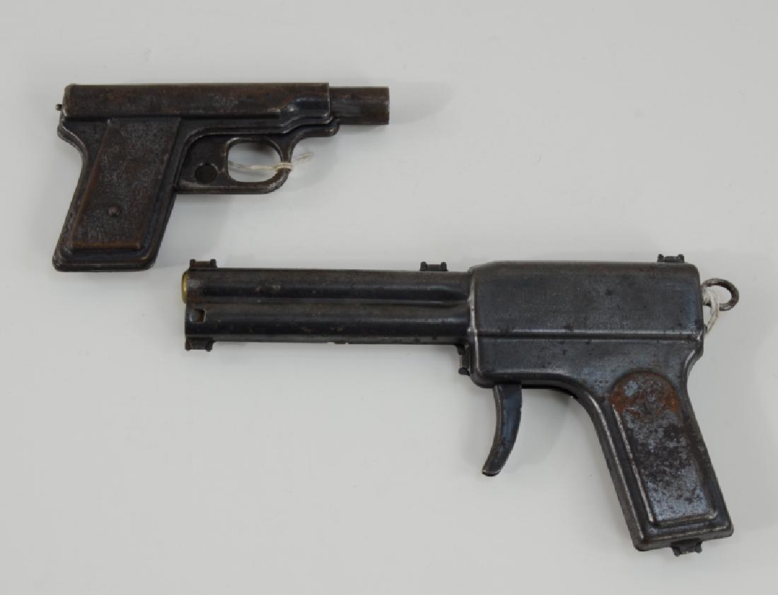 Two Daisy Squirt Guns: One No. 72 Squirt O Matic Water and noise pistol, and one Daisy No. 8 Water gun. Each about 30% Condition. Max length 8" Keywords: BB Gun, Rifle, Pistol, Airgun, Air Gun, Pellet, soft, target