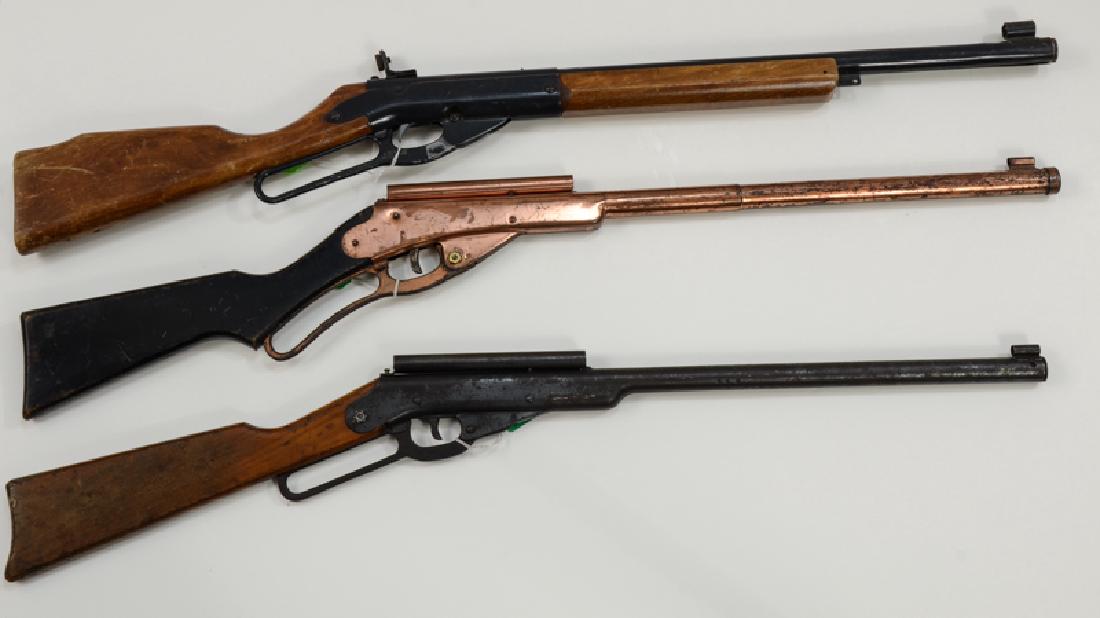 Three Daisy Target BB Rifles: all lever action, wood stocks, includes: Model 99, Number 50 Golden Eagle, Number 195. Each 20-40% Condition. Length 36" Keywords: BB Gun, Rifle, Pistol, Airgun, Air Gun, Pellet, soft, target