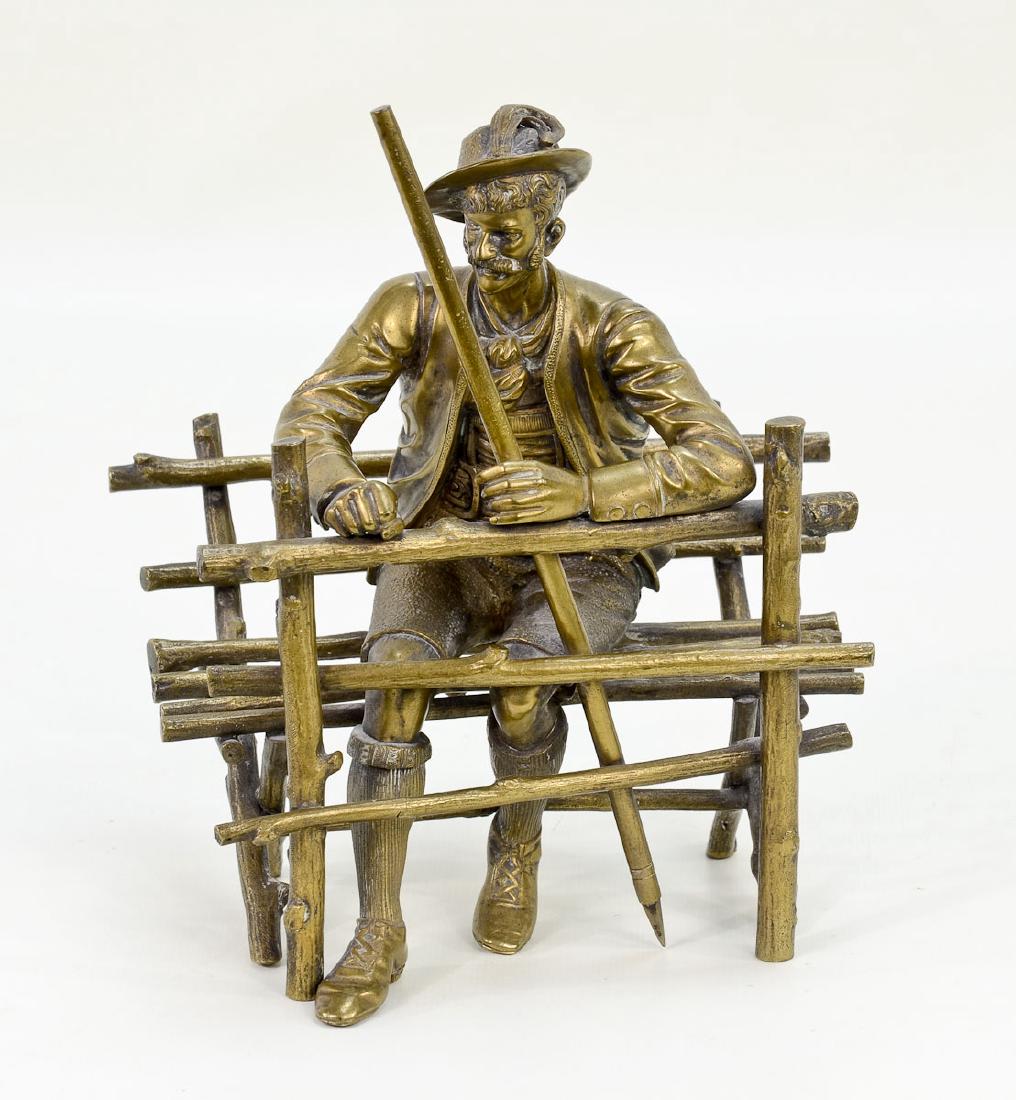 Brass Sculpture of Man on Bench (1 of 4)