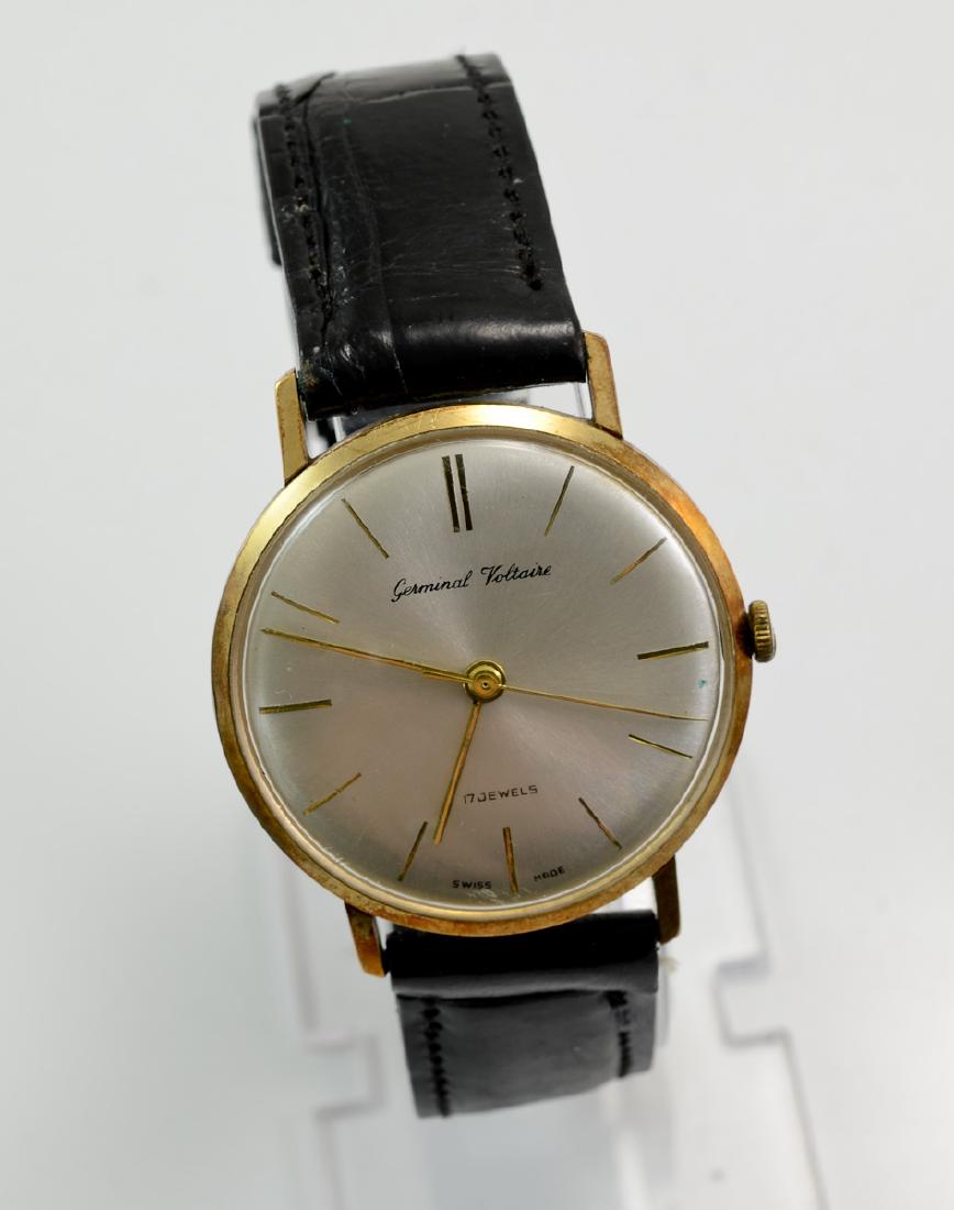 Mens 14K Germinal Voltaire Wristwatch: 30mm face diameter, 17 Jewels. Case marked 14K .585 SWISS MADE. Does not wind, set, or run. old leather band, Keywords: Wrist Watch, Estate, Gold,