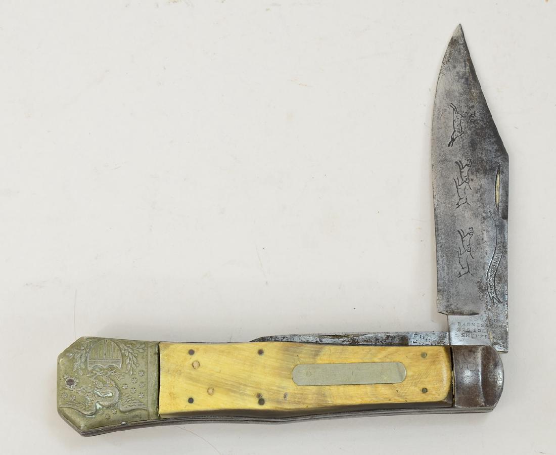 Large Edward Barnes Folding knife: 19th Century, Military, likely civil war era knife. Bone and Horn handles, two blades. Marked Edward Barnes & Sons 226 Solly St. Sheffield. Eagle and shield insignia on both sides. overall length (ope