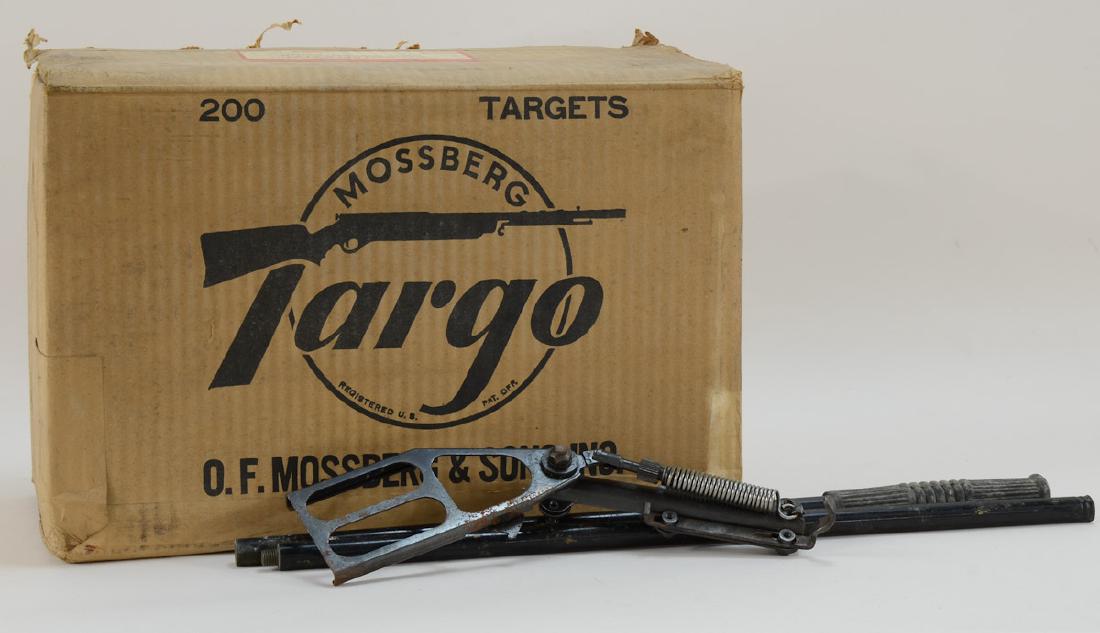 Mossberg Targo Clay Targets: Almost full Case of Original Mossberg Targo Clay Pigeon Targets with original Barrel Mounted Thrower. box measures 17" x 12" x 8" Shipping weight: 14 lbs.