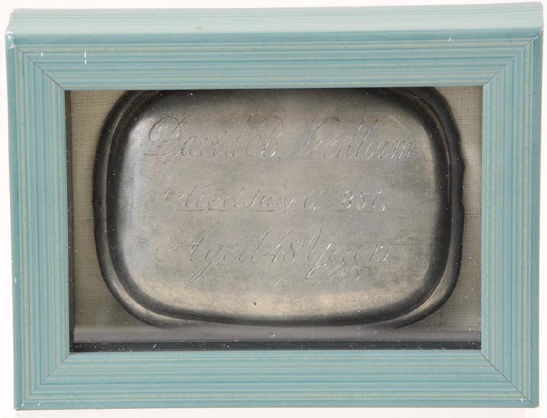 Antique Casket Plaque: Small shadowbox containing a pewter or base metal casket plaque that reads "David B Needham died July 6, 1857 Aged 48 years". The piece measures 4" X 3"