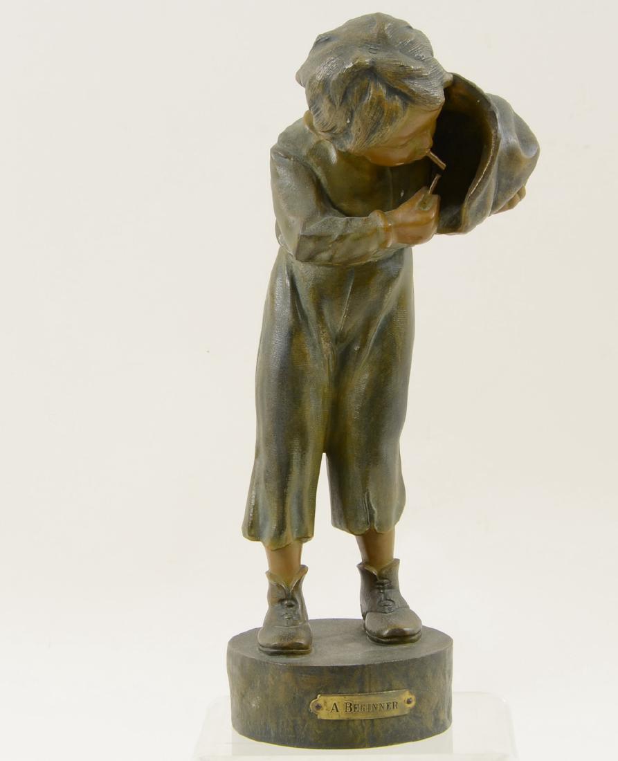 A Beginner Bronze figure (1 of 3)