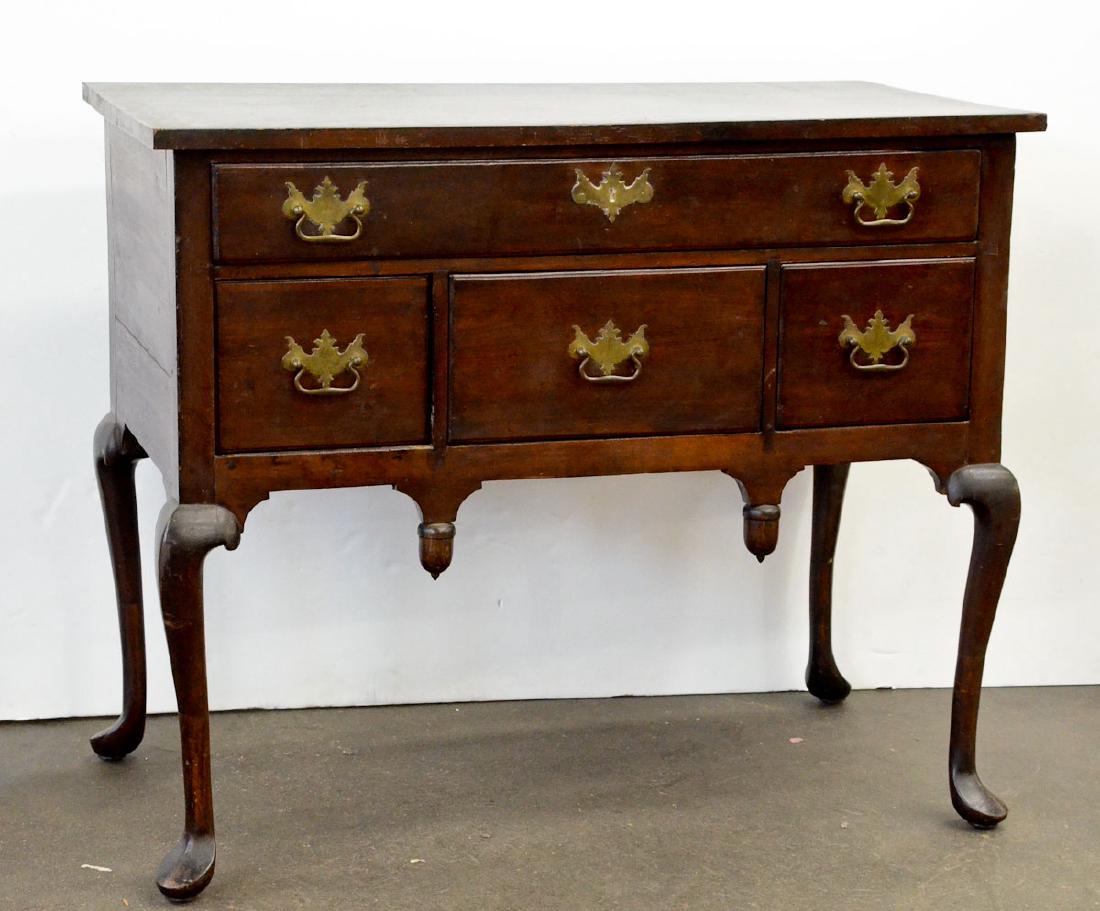 Antique American Lowboy: Top Replaced, Finials Replaced. Hardware appears original, finish appears original (except top). 35.5" tall, 42" wide 21.75" deep.