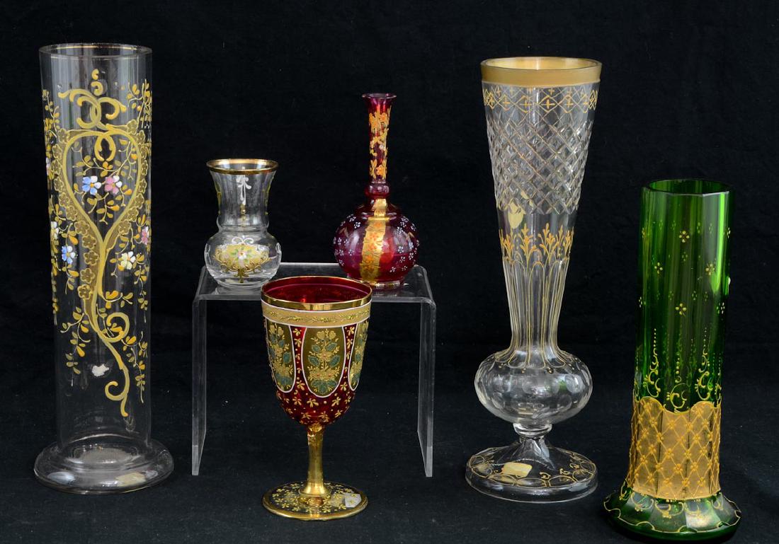 6 Pcs Bohemian Art Glass: Czech or Bohemian, Manner of Moser Art Glass, Cut and Enamel Decorated Art Glass in Green, Clear and Cranberry colors. The tallest 12". Includes Bud Vases, Tall Vases, a Trumpet Vase and a Wine Hock o