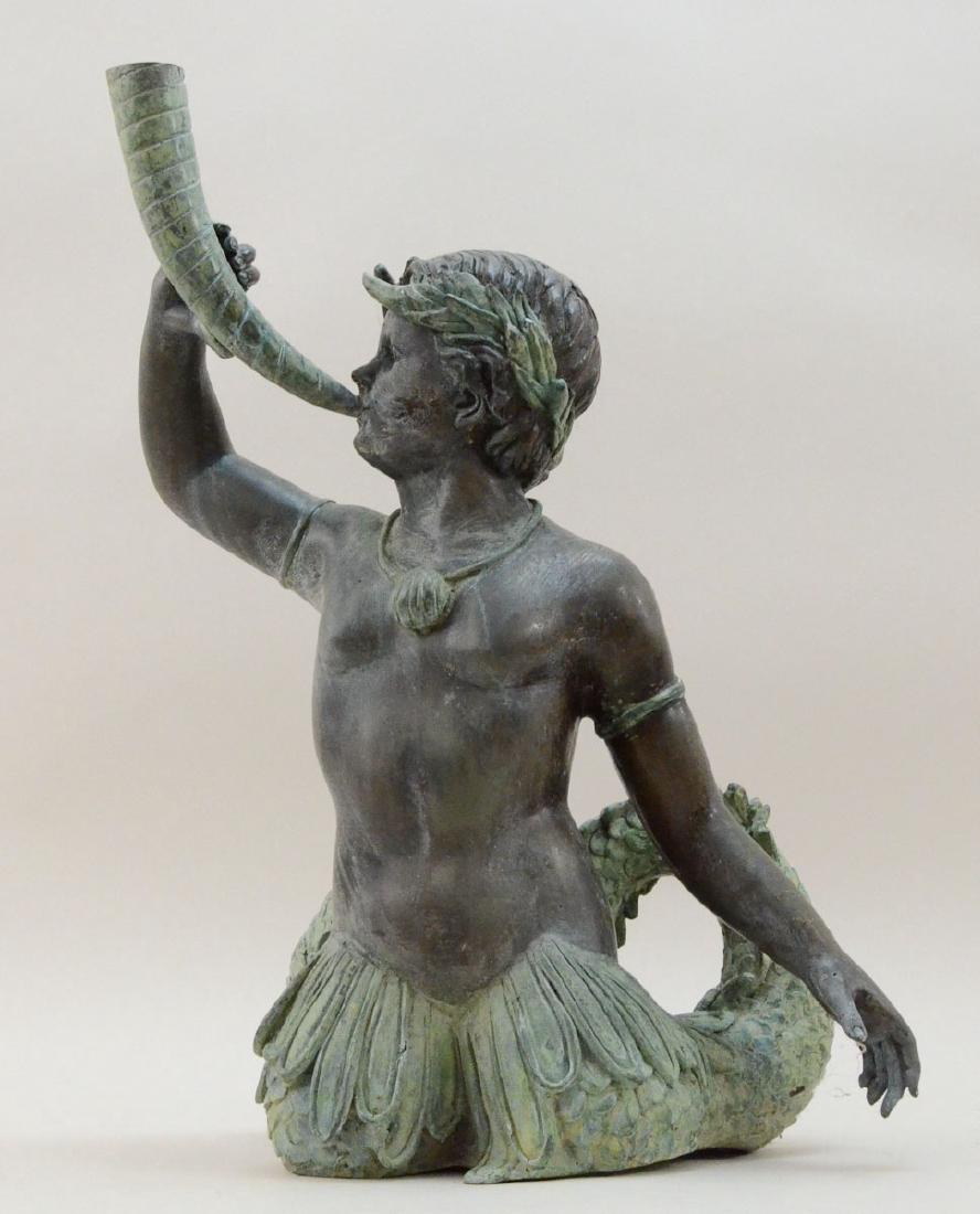 Bronze Garden Fountain: Mythical Split-tail Merman with horn. Patinated Bronze and other metals, 20th Century, 24" tall, overall good condition, with a dent (with crack) over left shoulder, outdoor patina. Keywords: Mermaid,