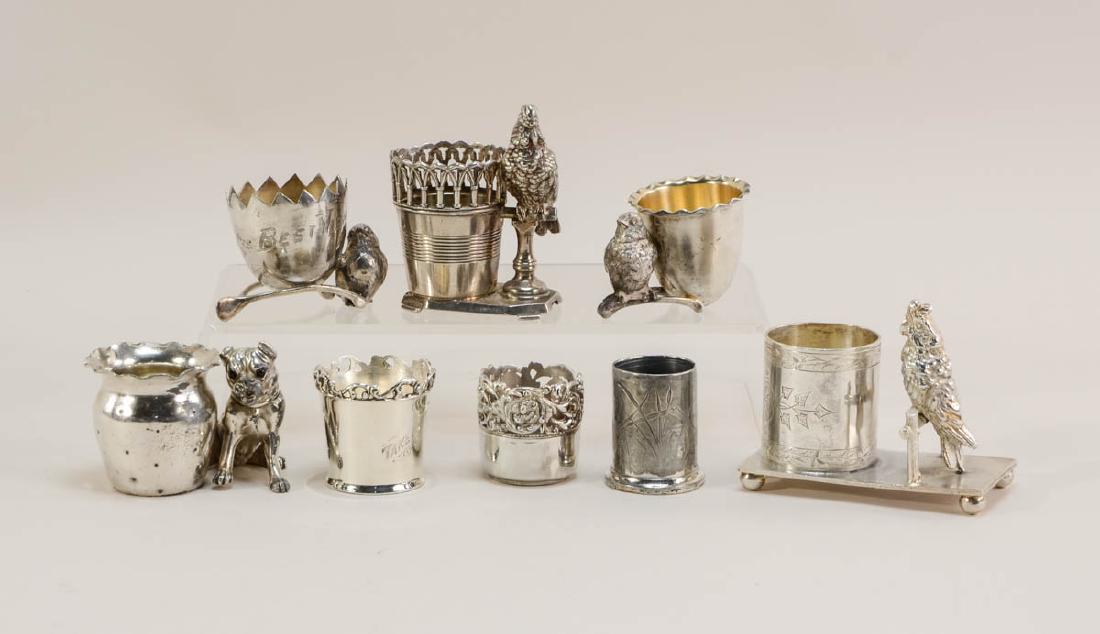 8 Figural Silverplate Toothpick Holders: Antique, American, Victorian era figural silver plate tooth pick holders or cups. Makers include James Tufts, Derby, Homans, Rogers Bros, Etc. Some Re-silvered. overall good condition each about 3.5"