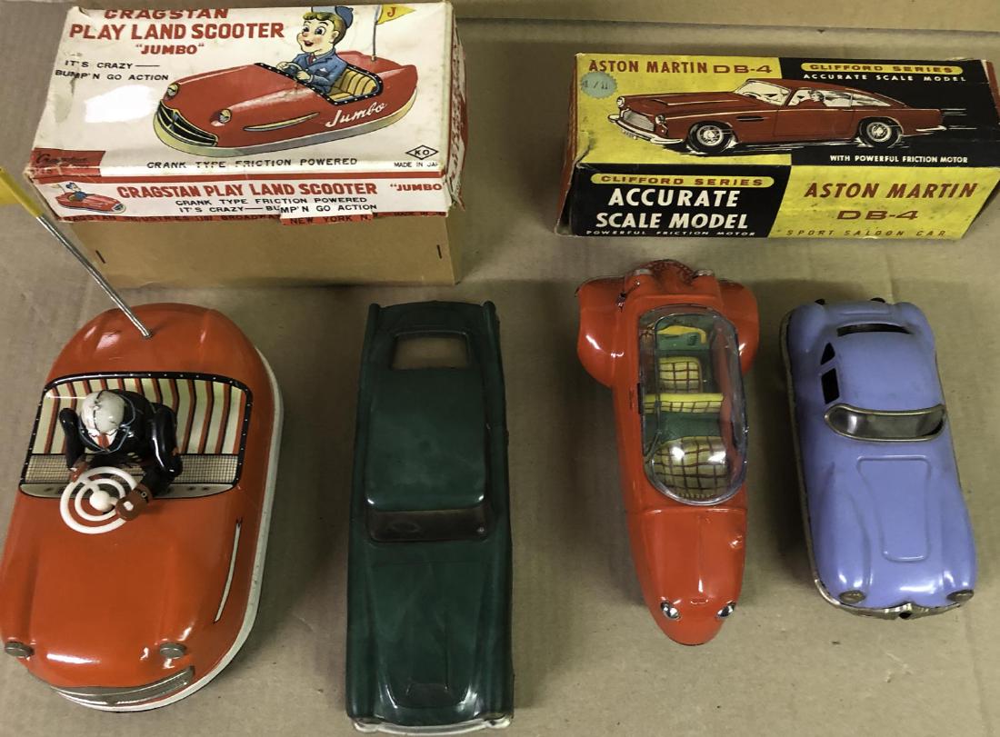 Four early toys - three tin, plastic Aston (1 of 2)