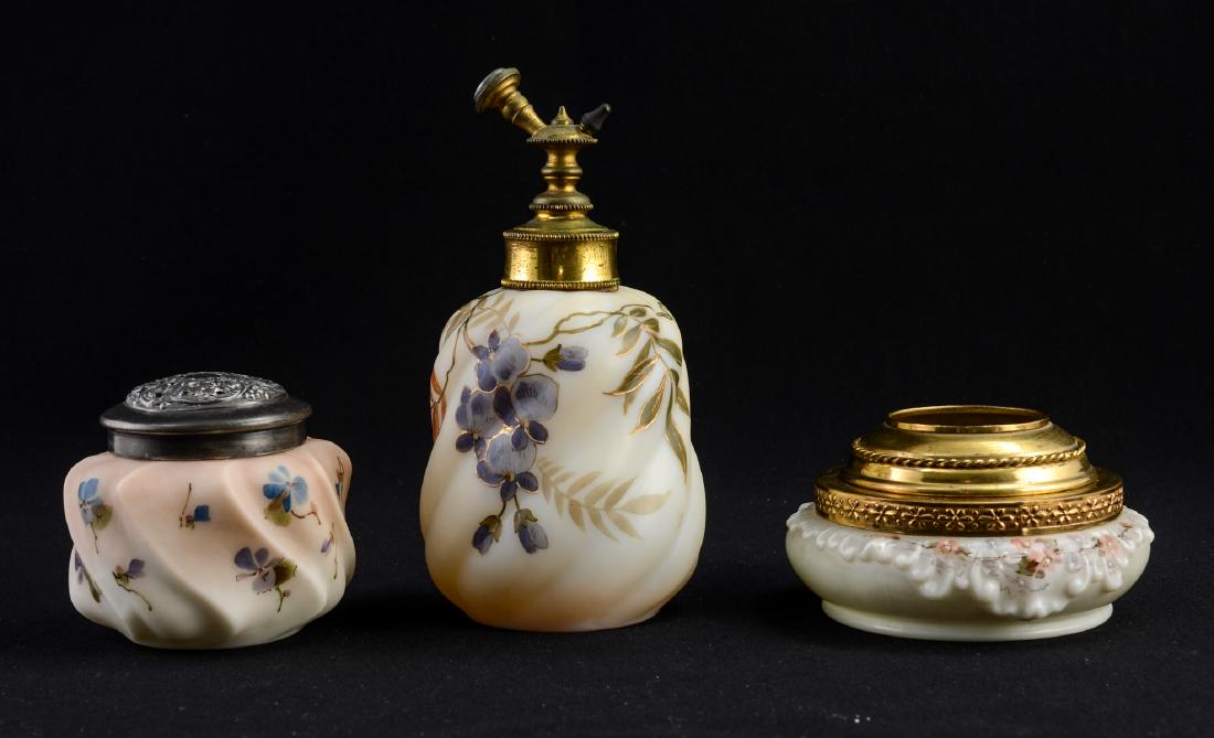 Three Pieces of C. F. Monroe Wavecrest: Excellent Group of Three Hand Painted Glass objects by the CF Monroe Company of Meriden CT. Includes a Hair Receiver, a Muffineer, and a Perfume Atomizer (No Bulb). Receiver is signed with Wave Crest 