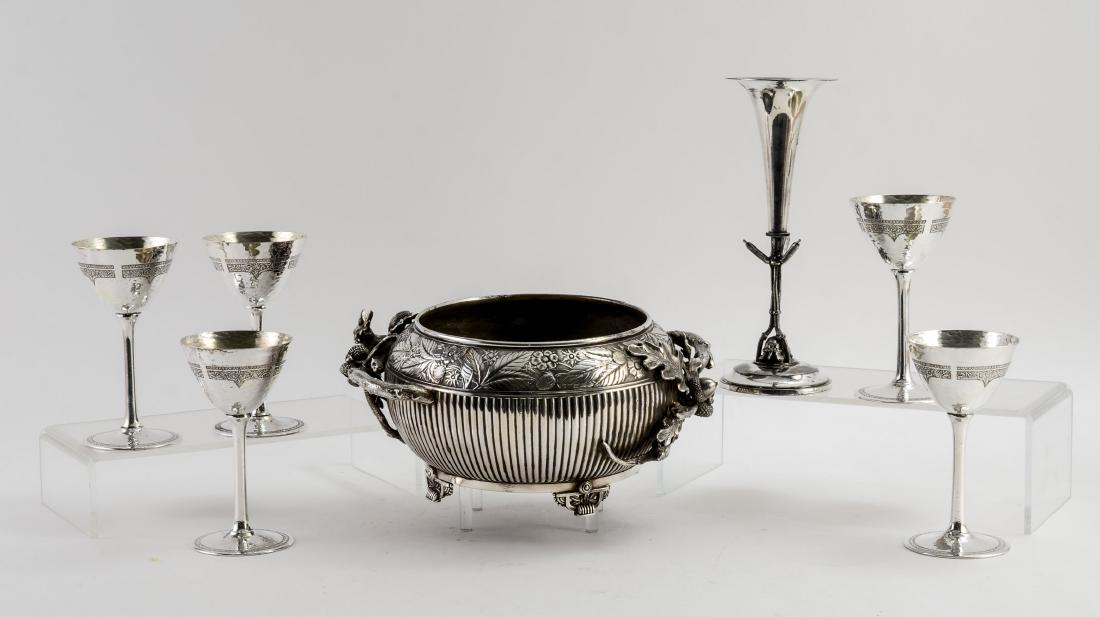 Group of Meriden Made Silver Plate: Includes a Meriden Quadruple Plate Figural Squirrel Nut Bowl, Five Hammered International Silverplate Cordials, and a figural Turtle-Form Bud Vase. all in good to very good condition.