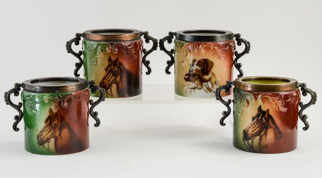 Four Handel Ware Glass Cigarette ar: Arts & Crafts Era Fancy Molded glass cigarette jars by the Handel Company of Meriden CT. Three with hand painted Horse Portraits, and one with a Sporting or Bird Dog Signed Bauer. Each in good conditi