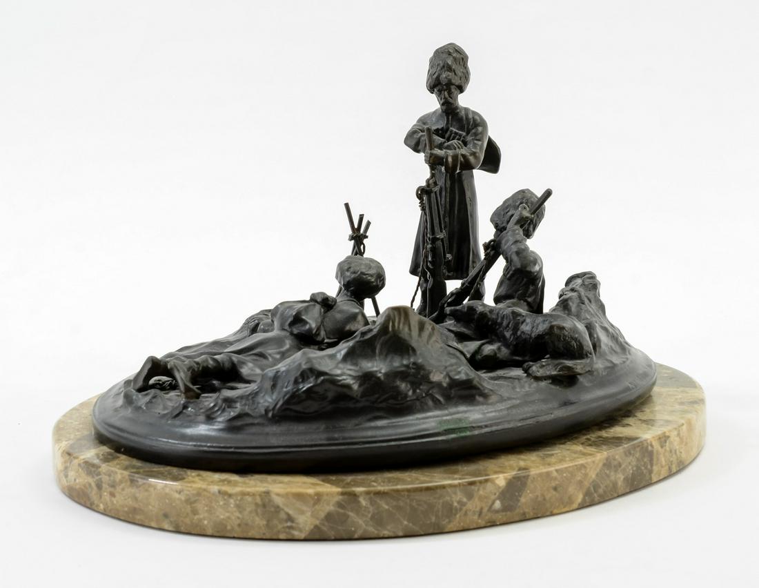 After Vassili Yacovlevitch Grachev: Cast Bronze Figural Group of Soldiers resting by a campfire. Impressed signature of Vassili Yacovlevitch Grachev, and F. Chopin. 20th Century. Fine Stone Plinth. Large Size: 13" x 9" x 7.5" Very good