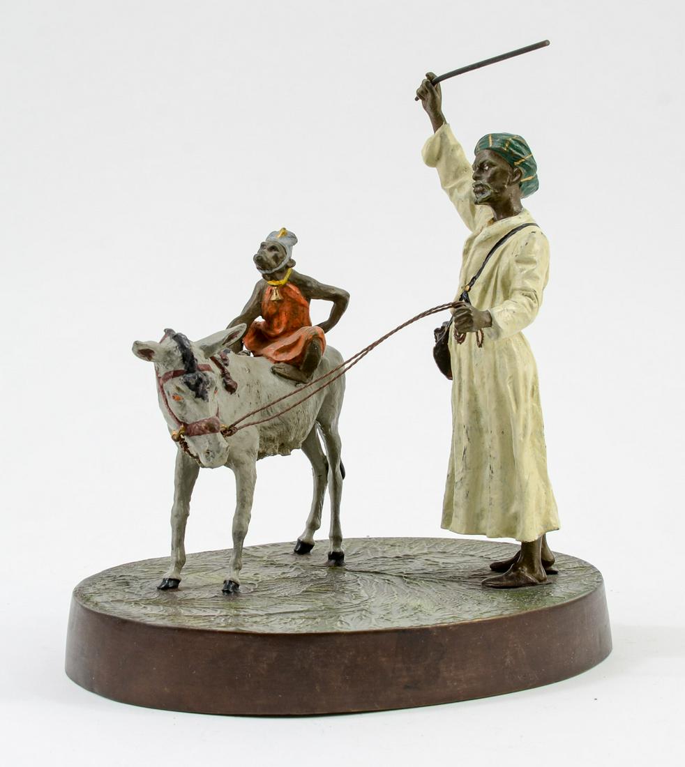 Bergman Orientalist Bronze Group: A man whipping a Donkey with a Monkey riding on its back. Signed on the ground: NAM GREB. Large size: 10" x 9" x 7". Cold Painted, Solid Cast Bronze. Minor paint losses, overall very good plus conditi