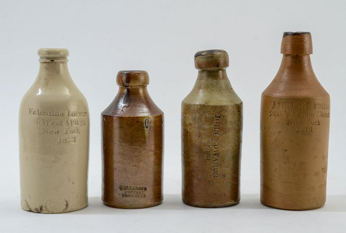 Four Stoneware Bottles: This group of stoneware bottles typically used for ginger beer, Mead, etc. There is a 6 1\2" bottle marked John Edwards N.Y. 1851, 6" marked Wallabout Pottery Brooklyn, a 6 3/4" Bottle marked Valentin
