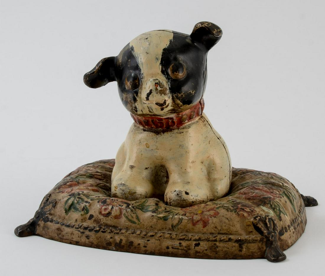 Cast Iron Dog on Pillow Still Bank: Painted Cast Iron, Three parts. Original Paint with some losses. Marked Fido on Collar, Patent Date on back of head. Keywords: Hubley, Antique, Doorstop, Doggy,