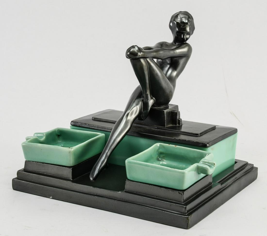 Rare Art Deco Frankart Desk Set: Painted Cast Metal with Jadeite Glass Insert and Matte Green Pottery Ash tray inserts. Figural Nude Dancer resting on top of the Cigarette Box. Signed FRANK ART INC. PAT APPL. FOR. Original surface, w