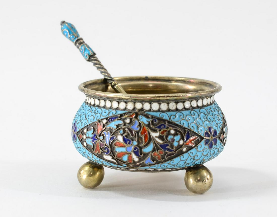 Russian Cloisonne on Silver Open Salt: Very fine Russian cloisonne on silver open salt with original spoon. Both hallmarked: Gustav Gustavovich Klingert (Moscow, 1908 - 1917) and 84. Set on ball feet. 2" diameter x 1 1/4" high. Excellent c