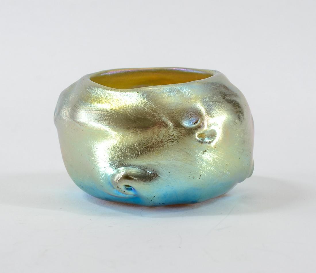 Tiffany Gold Favrile Open Salt: Tiffany gold favrile open salt. Globular with pulled pigtails. Polished base, etched: 0426. First quarter of the 20th century. 2" diameter x 1 1/4" high. Excellent condition. Keywords: Salt Cellar, Sa