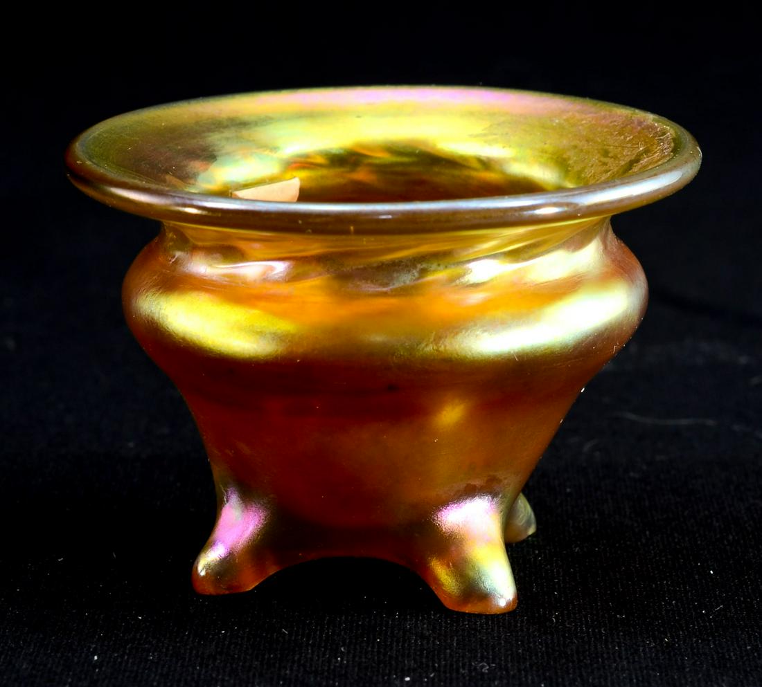 Lundberg Studios Art Glass Open Salt: Footed single gather, aurene or favrile style gold Salt Cellar by Lundberg Studios. Signed L.S. on base. Pontil mark, square ground feet Excellent Condition, 1.5" x 2"